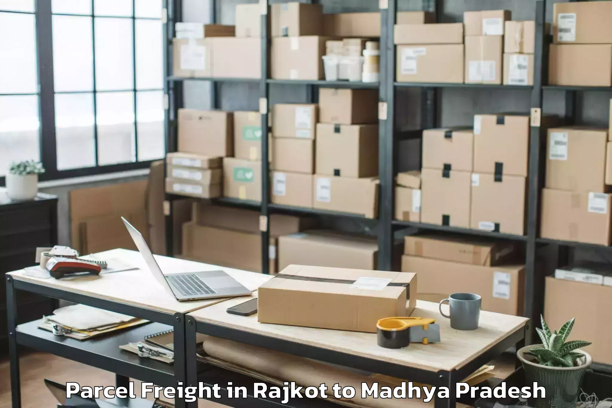 Book Rajkot to Dola Parcel Freight Online